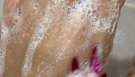 Bubbles and red pedicure