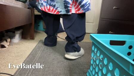 Eve Walks Around In Overstuff Slippers And Shackles
