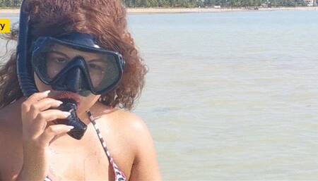 Breath play with mask in the sea