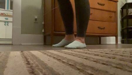 Dirty low cut socks and dirty bare feet