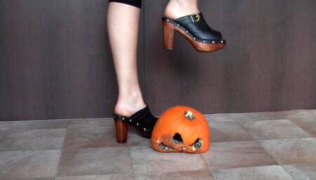 The Pumpkin is Crushed to mush under Sophias Sexy Clog heels!