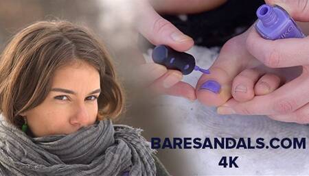 Teresa puts nail polish on her toes barefoot in snow - 12400 - 4K