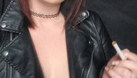 Smoking in leather topless feeding you my ash on a lead