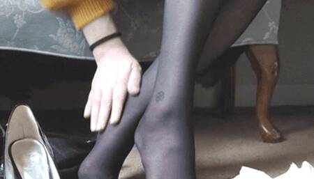 Secretary Nose Blowing and Massaging Legs in Panthose After Work