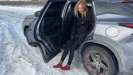 A girl in ballet flats walks on slippery ice, slips many times, loses ballet flats (reissue)