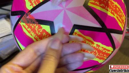 Thumb nail against 2 balls