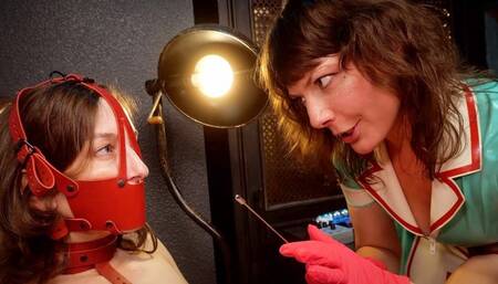 A Hole New World - Elise Graves and KissMeDedlyDoll - Latex Nurse Doll performs invasive sounding treatments on Elise's tiniest hole along with electro treatments on her most sensitive bits!