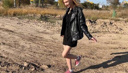 girl in sneakers and white socks walks through dirty puddles (reissue)