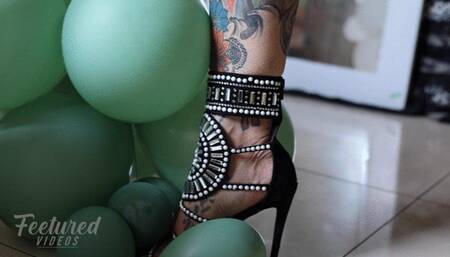 Balloon popping with heels