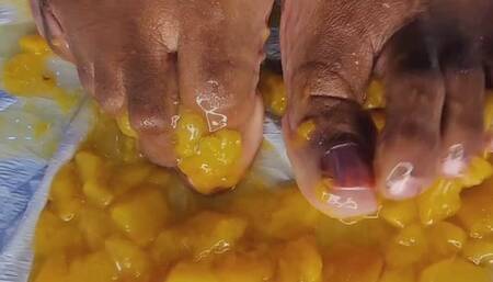 Tinas Flat Feet - Peaches Smash - A close up sensory-rich video of feet smashing ripe peaches, creating visually engaging blend of textures and sounds