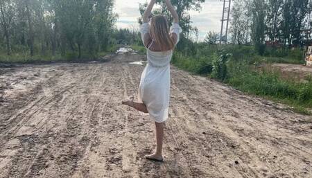 a girl in ballet flats went onto a country road where there is a lot of slippery mud, she slips and her ballet flats are all covered in mud (reupload)