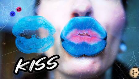 Goth girl kisses with big blue naughty lips