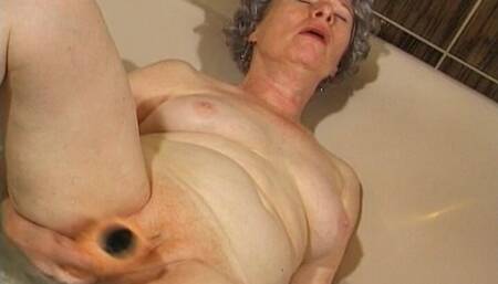 Amateur German Granny Playing with Her Toy in Bath