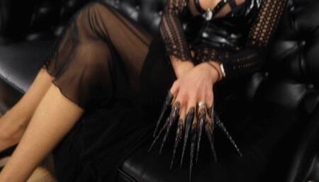 The lady teases with her nylons and hurts with her claws