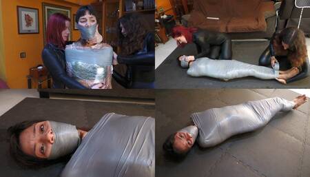 Mayla mummified by the catsuit burglars!