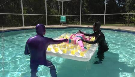 TS Nyxi and Rubber_Jeff â€œThe Dildostick for Rubberdoll Lara on the Pool Floatâ€