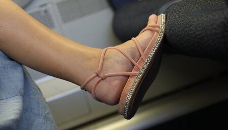 Bratty candid foot fetish girl puts her feet on seat, nice feet and sandals details