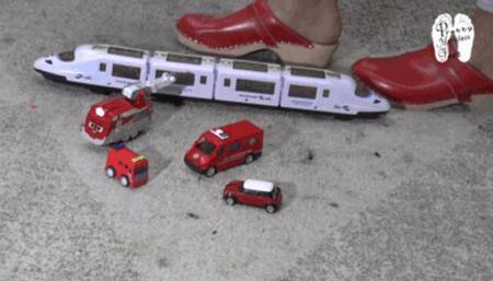 Toy Cars under wooden Clogs 3