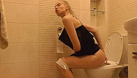 Toilet sexy blondie in a black short dress! MP4
