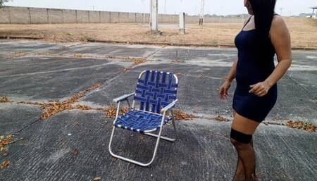 High heels dangling from fishnet stocking feet are enjoyed in the park (3)