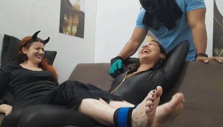 Amanda and Paola at an intense Halloween tickling party