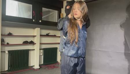 Marie Mueller bound and gagged in shiny nylon Rainwear