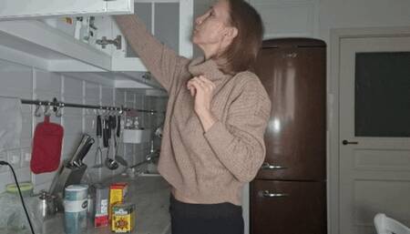 Reach high in the kitchen and belly showing 2