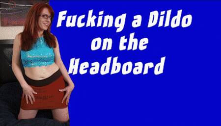Fucking a Dildo on the Headboard
