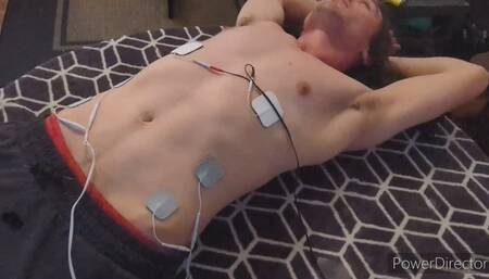 Bound muscle twink with electropads and nipple clamps cranked up high