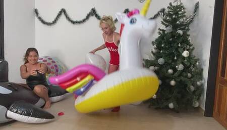 Carmen and Regina popping balloons with inflatables!!