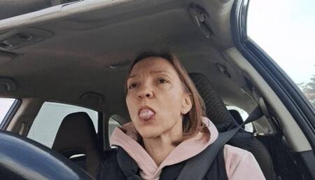 Car driving blowing bubbles and crack chewing gum