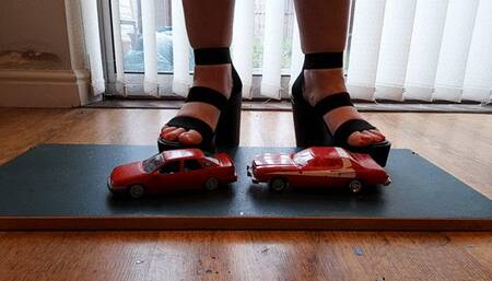Giantess Lou crushes a 1990 Ford Taurus & Ford Grand Torino in big black chucky heels low ground view