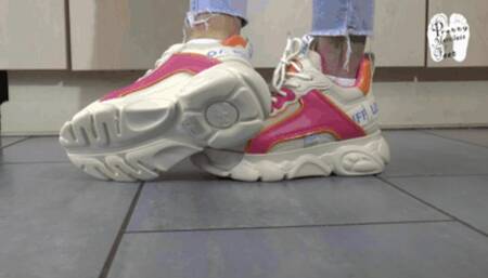 Testing her new Buffalos Sneakers floor view