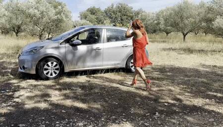 Joyce is so excited to drive - red dress and red heels