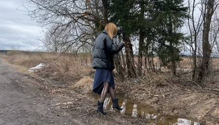 the girl in high-heeled boots wanted to take a shortcut home and went through the field but didn't expect there to be a lot of mud there (Re-realize)