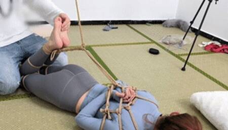 xy237 - barefoot yoga teacher tied up with ropes and playing with her bare feet