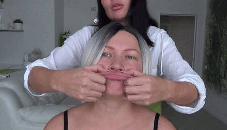 giving her BIG fish lips and pinching her stretchy face Li