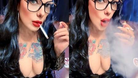 Smoking a Dunhill and blowing smoke in your face, wearing a black PVC catsuit to match my lungs