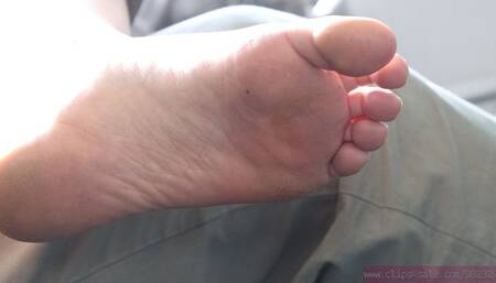 Dirty barefeet on seat, nice bare soles close-up