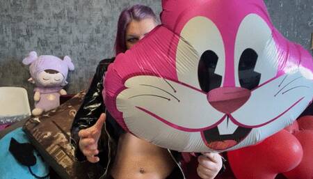 Val poping mylar balloons