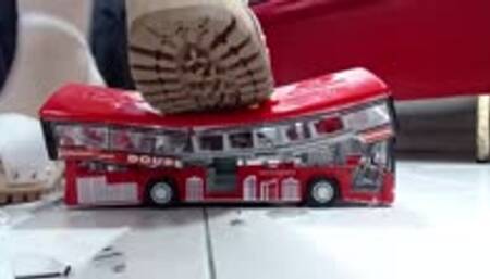 crushing big London Bus with nylons and 3 hot sandals