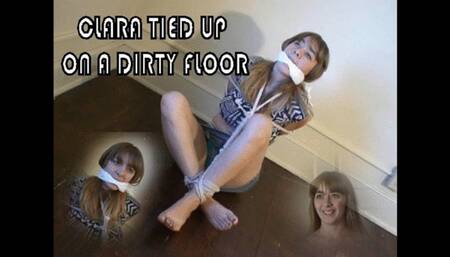 Clara Tied Up On A Dirty Floor