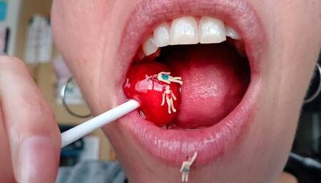 Lania eats a chupa chups candy full of tiny slaves