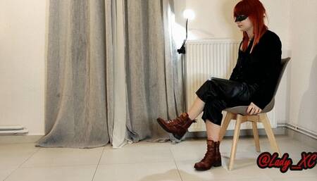 Boots worship with a twist on the slave's hands!