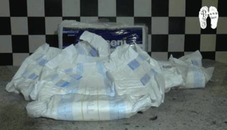 Diapers under high heels floor view