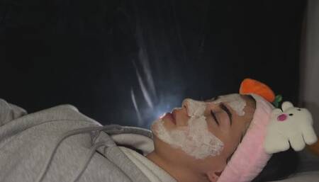 SMOKING HANDY NOSE EXHALES WHILE LYING IN BED