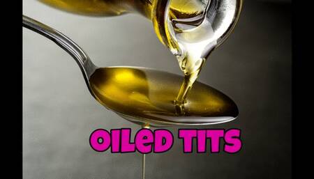 i play with my oiled tits