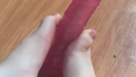 Footjob in a dildo