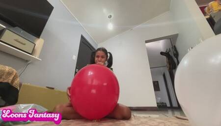 Akina blowing balloons on a brazil t shirt