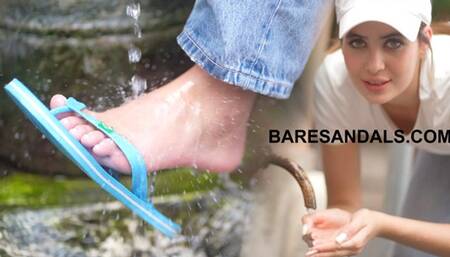 Pamela feet and flip flops getting wet under the fountain - 25012 HD